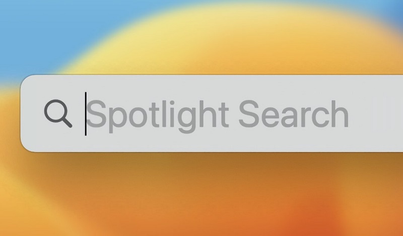 Nhấp vào biểu tượng Spotlight (kính lúp trong thanh menu) > nhập Cài đặt hệ thống (System Settings) vào thanh tìm kiếm, rồi nhấn phím Enter là được.